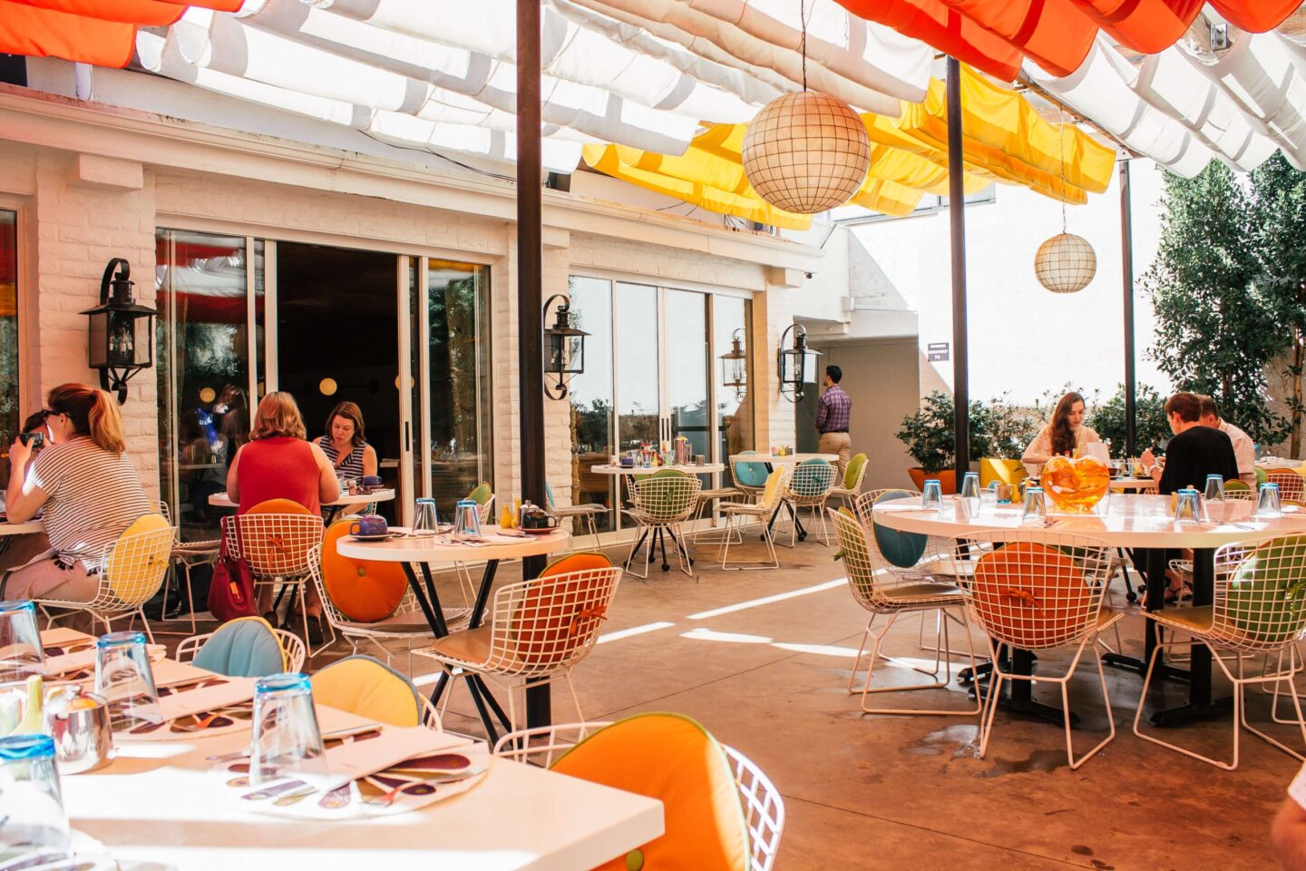 The citrus coloured patio of Norma’s restaurant at the Parker Palm Sprigns