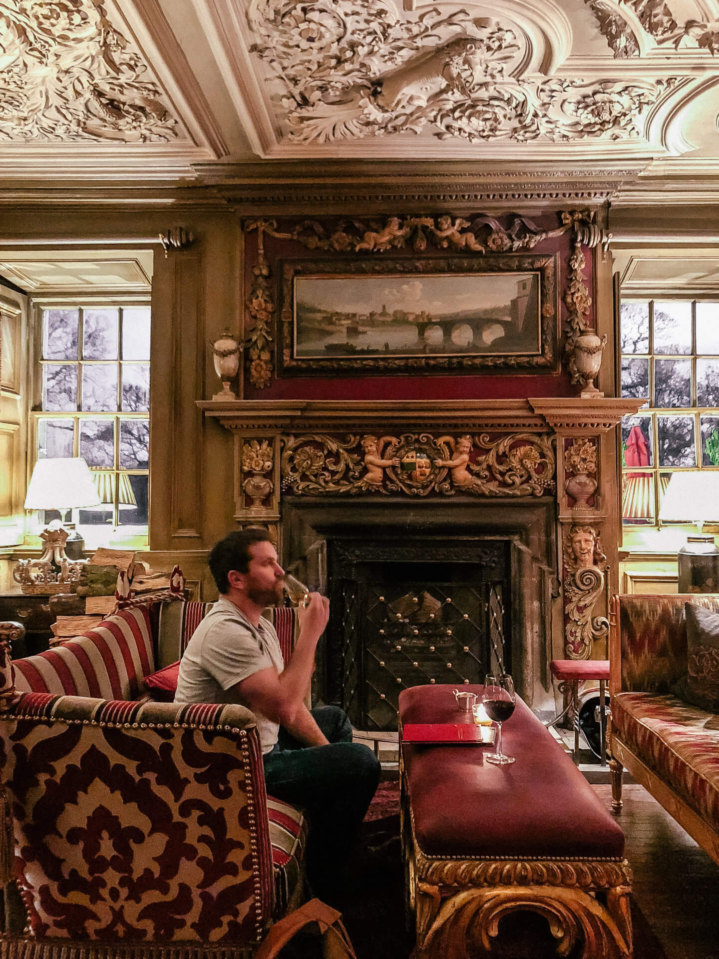 Man drinking at Prestonfield House in Edinburgh