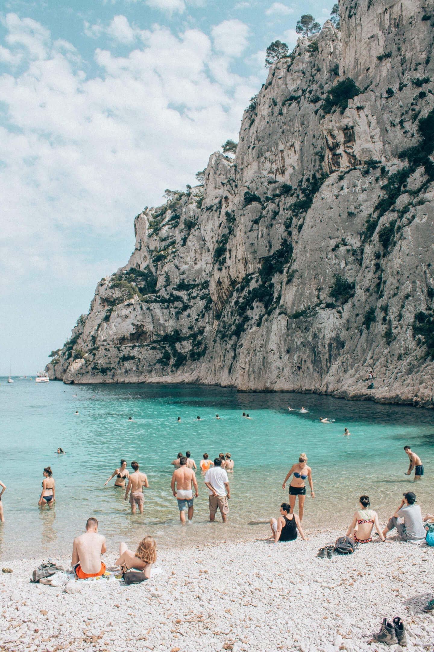 People swimming at Calanque d’En Vau beach in Calanques National Park