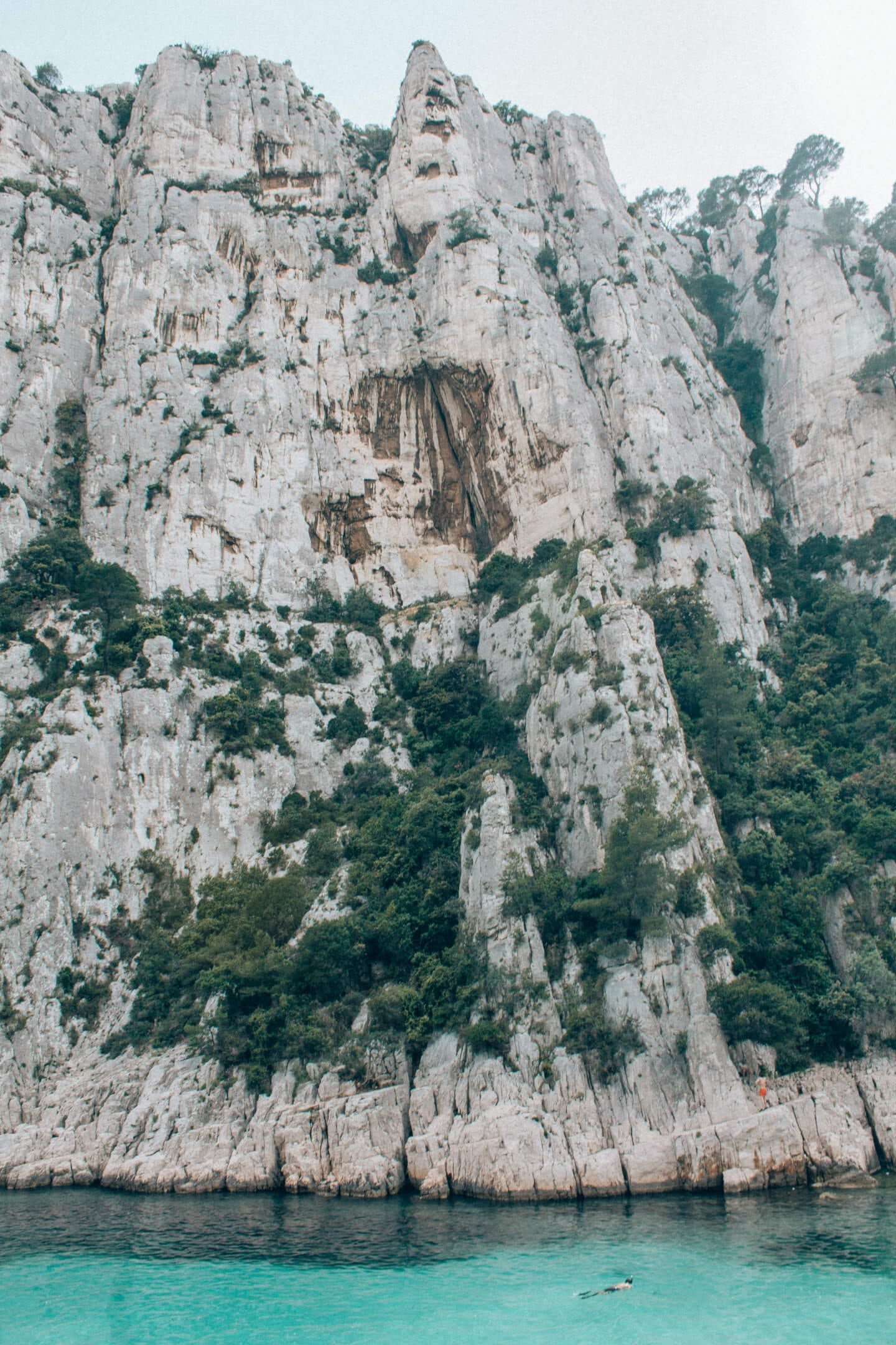 Massive limestone cliffs at Calanque d’En Vau beach in Calanques National Park