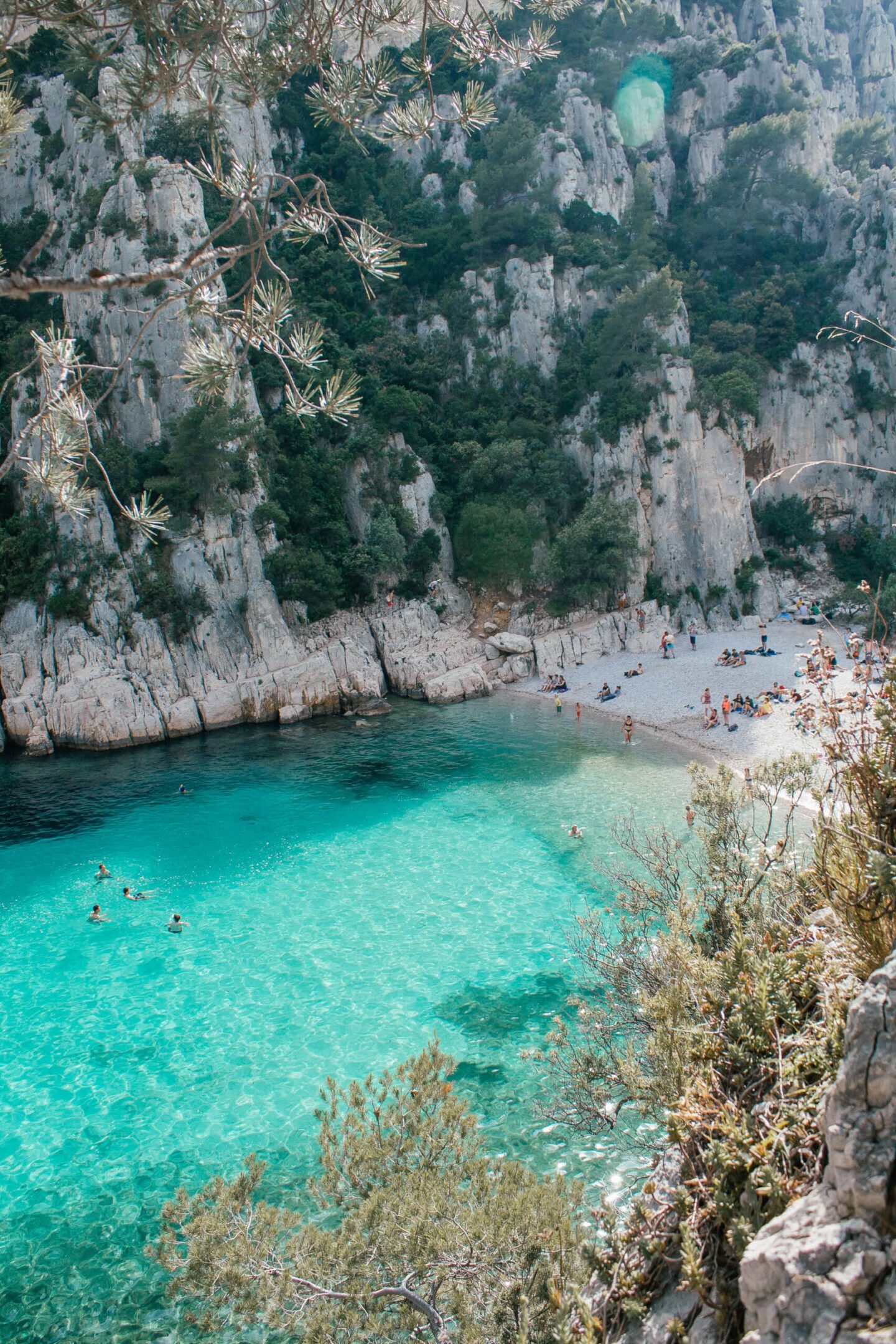 Looking down at the clear blue water at Calanque d’En Vau beach in Calanques National Park