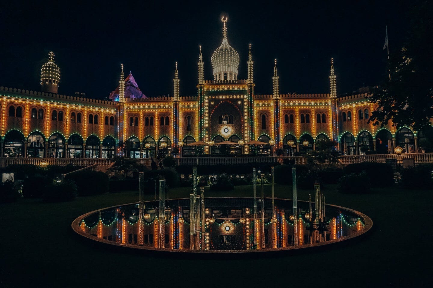 #Copenhagen Itinerary: 4 Days for First-Time Visitors - Tivoli Gardens at night all lit up!