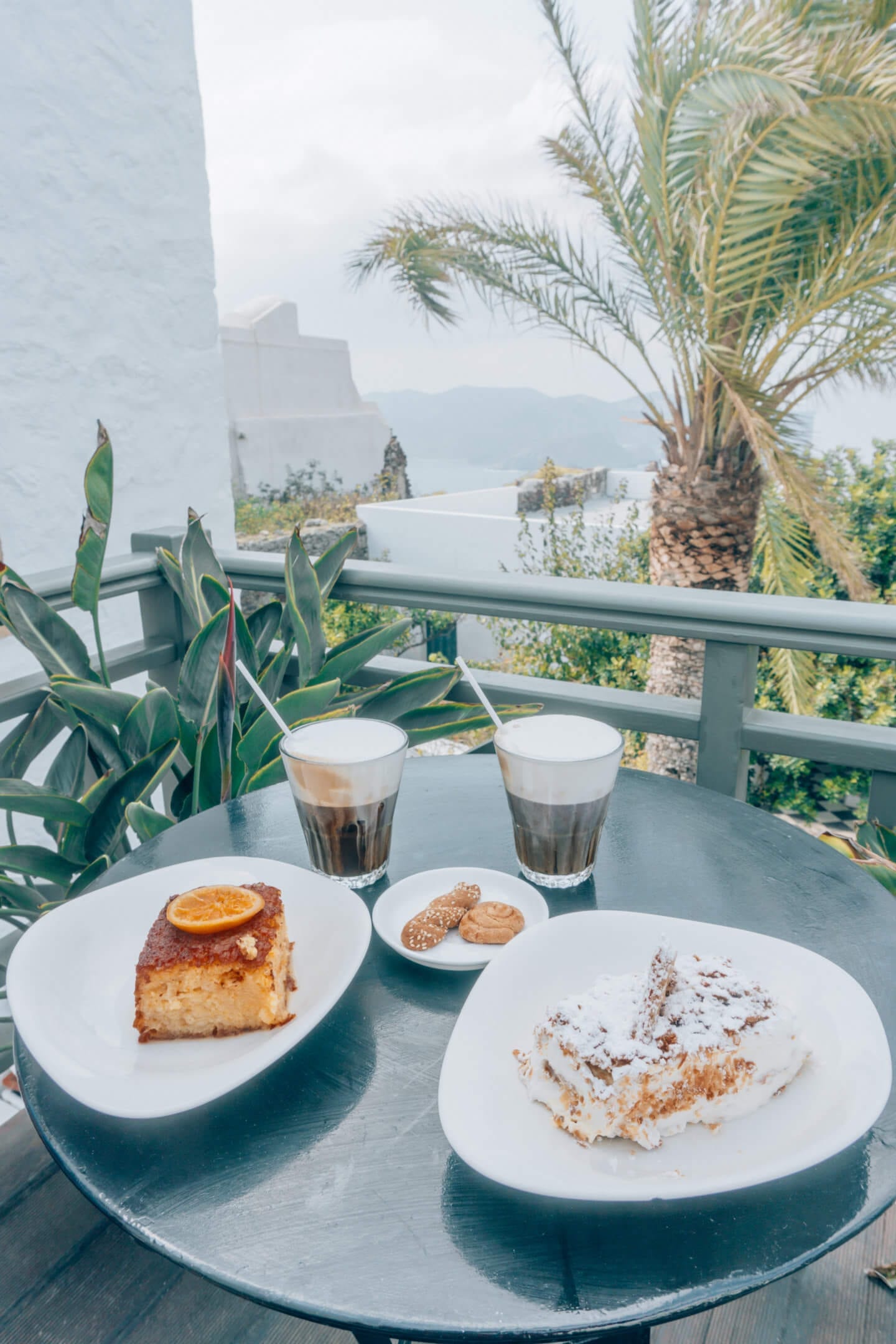 Freddo coffee and pastry with a sea view at Palaios Coffee in Milos