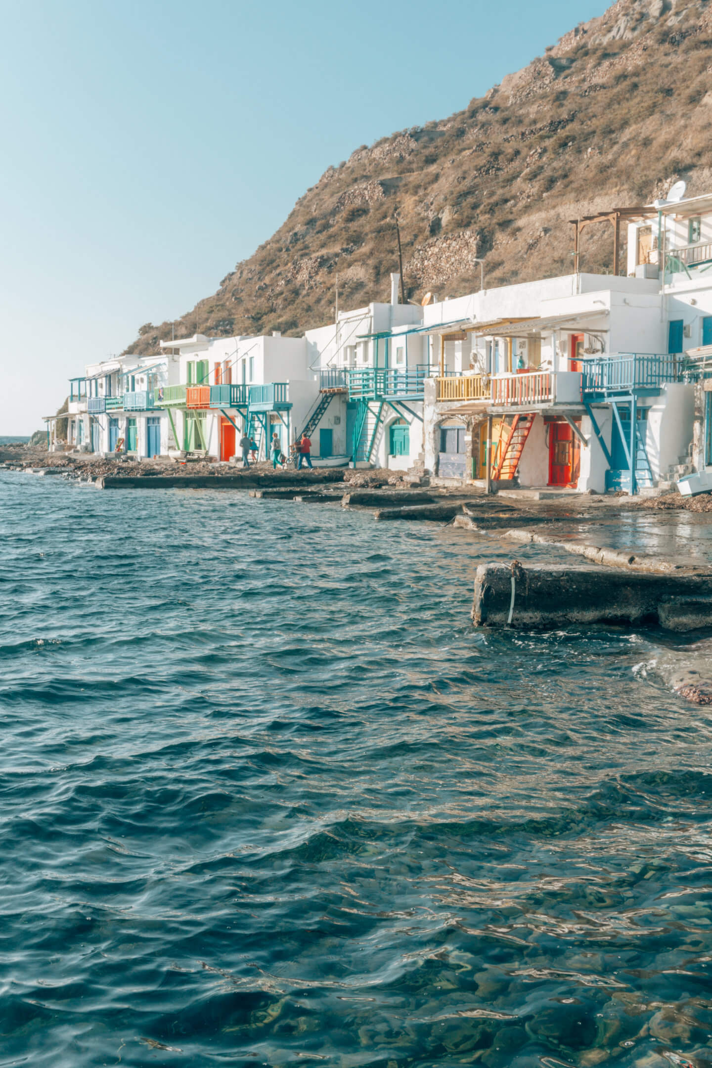 Colourful houses near the ocean in Klima - Milos travel guide