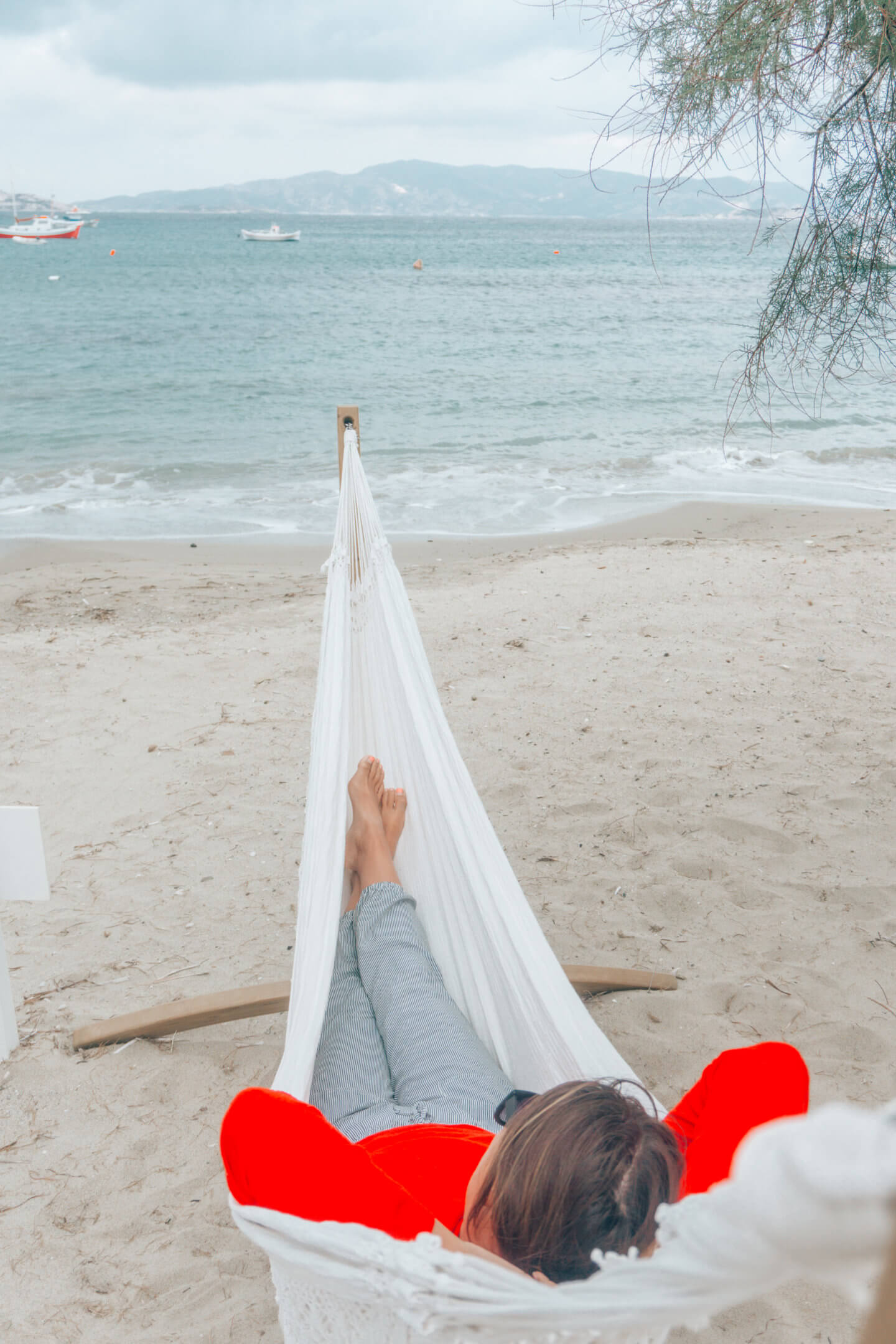 Relaxing in a hammock Pollonia in Milos