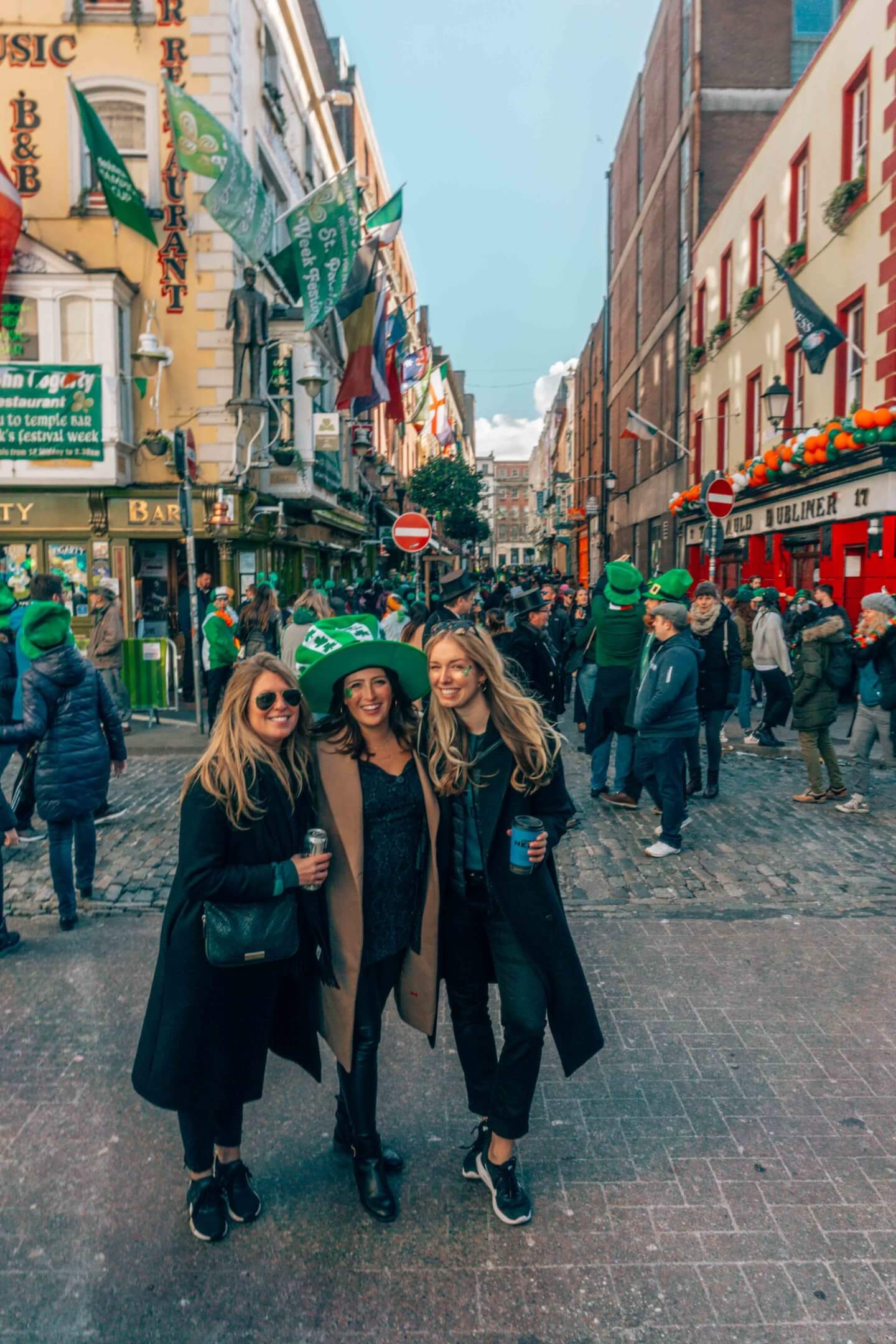 Three girls celebrating St Patrick’s Day in Dublin