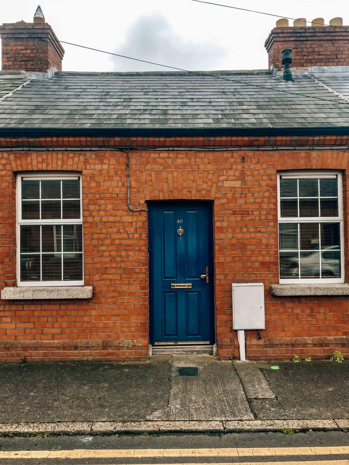 Blue Door on a brick house in Dublin, Ireland