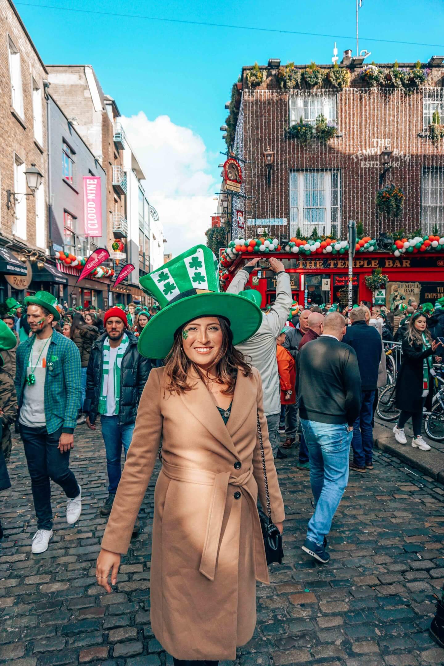 Girl wearing a green hat celebrating St Patrick's Day in Dublin