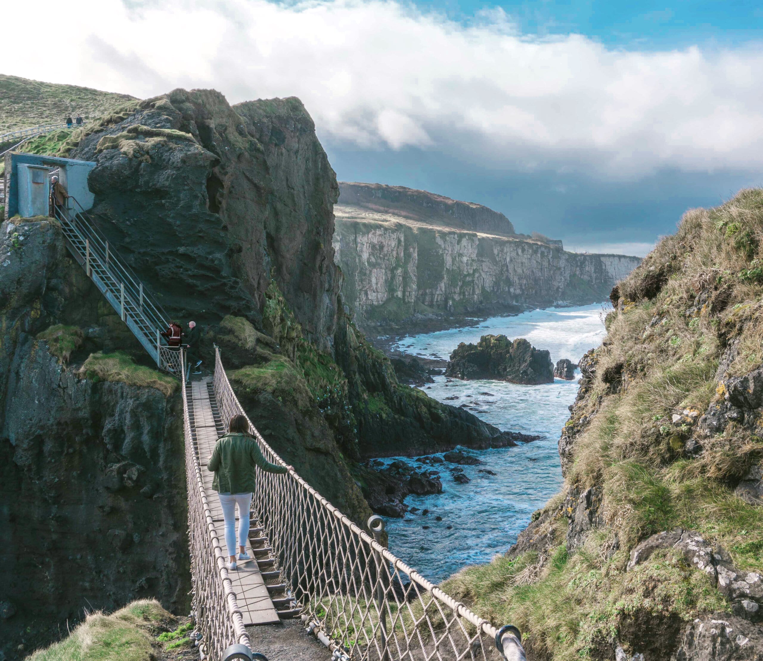 Places to visit in Ireland - A Girl crosses the National Trust Carrick-a-Rede Rope Bridge