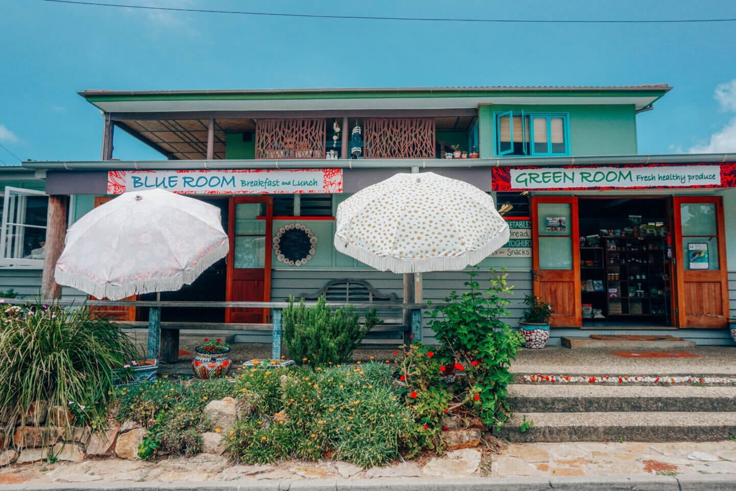 Blue cafe and green room grocery store on Stradbroke Island