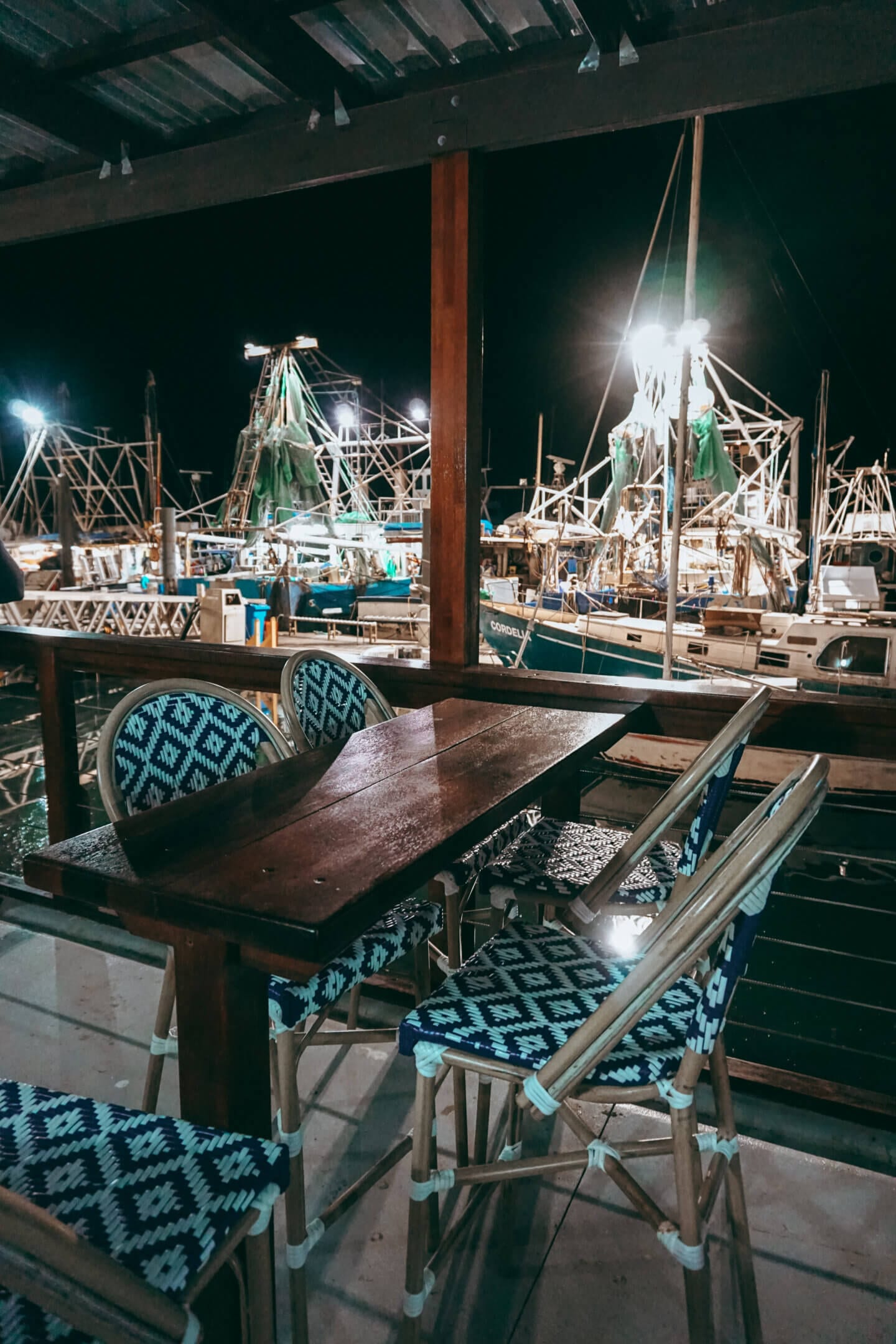 Bird's Fish Bar's back patio table that looks out at the fishing boats 