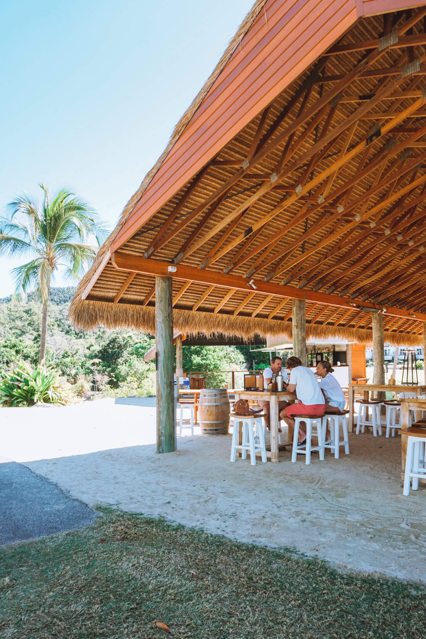 A group of friends having lunch at the Northerlies Beach Bar in Airlie Beach