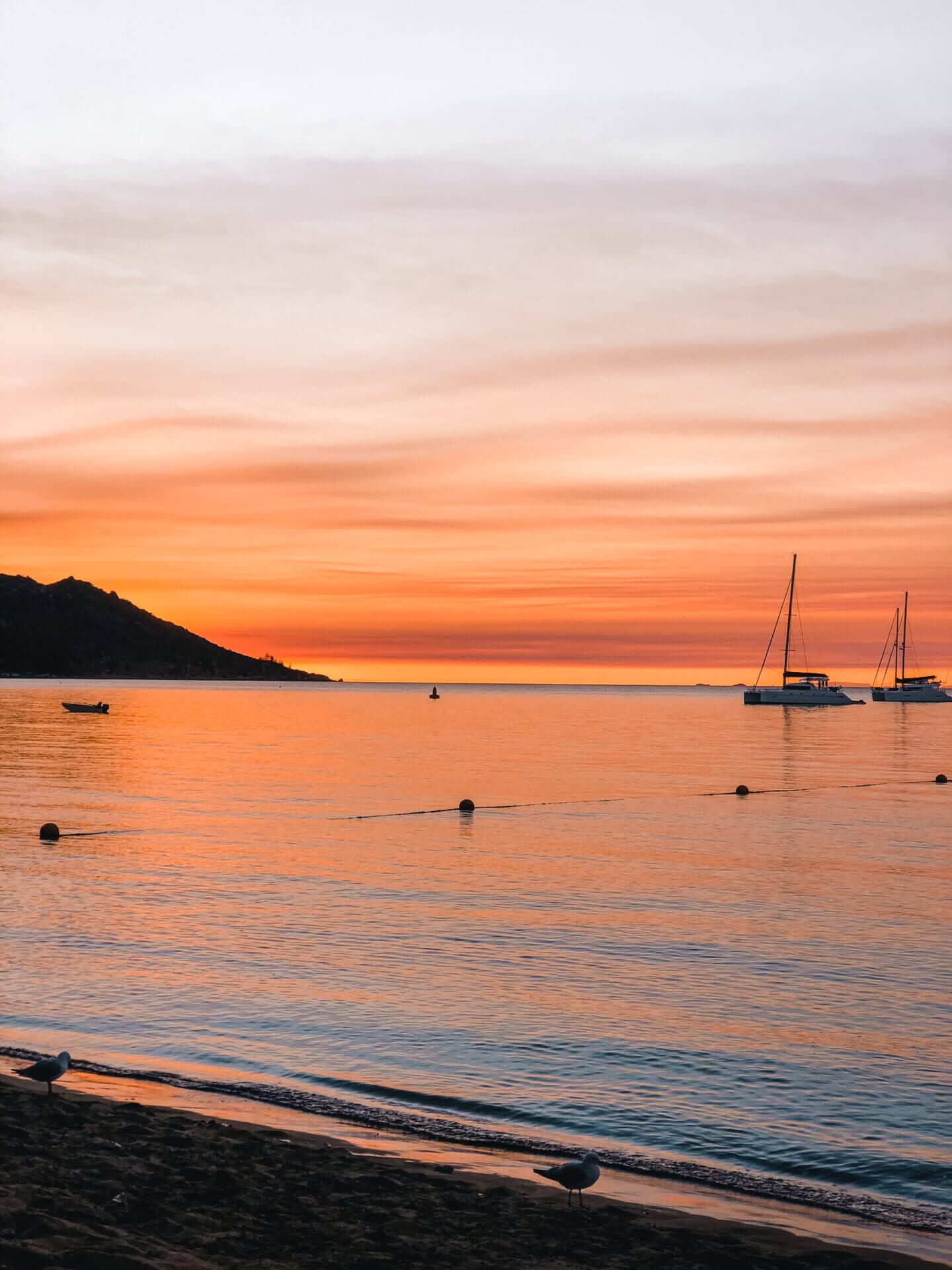 Bright orange sunset in Horseshoe Bay on Magnetic island