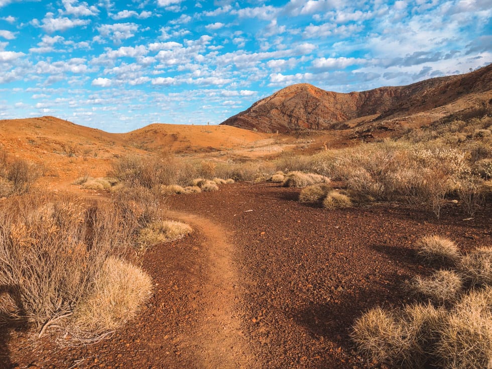 Don't miss hiking trails around Ormiston Gorge on a road trip between Alice Springs and Uluru