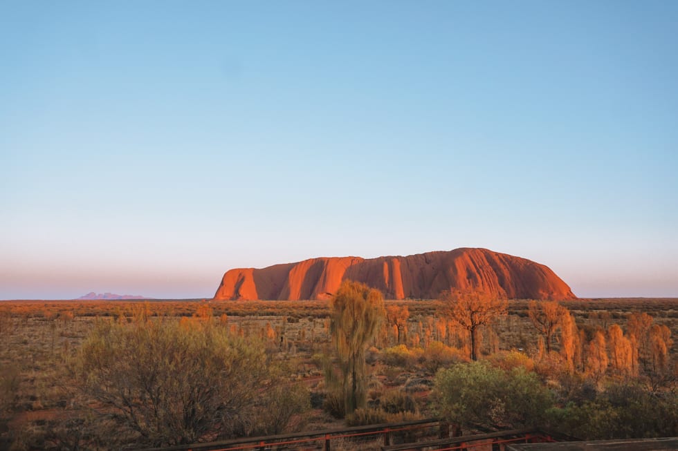 Sunrise at Uluru sunrise platform with Kata Tjuta in the background