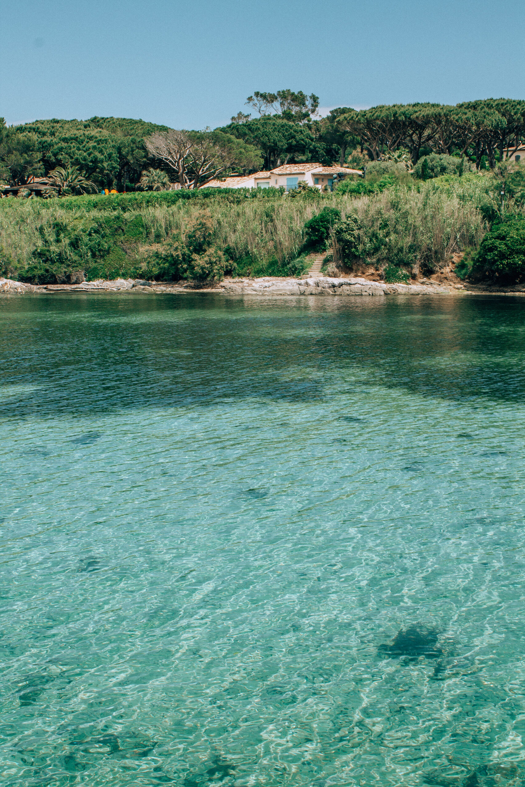 The crystal clear turquoise Mediterranean ocean near Saint Tropez, a top place to visit in France.