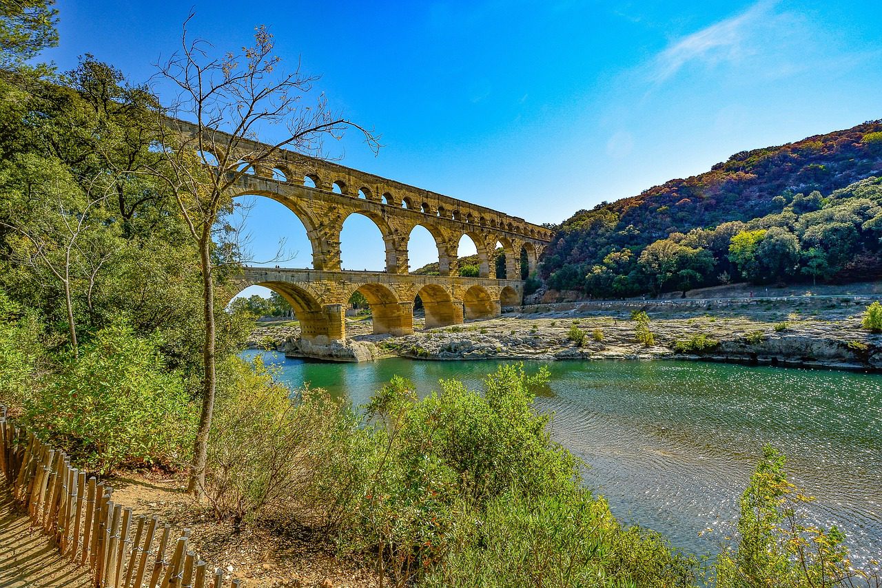 The Pont du Gard is definitely a top place to visit in France on a sunny day in the summer.