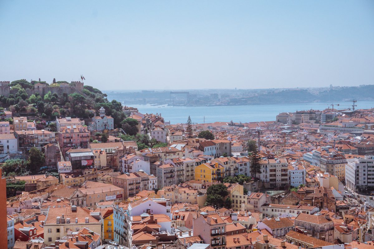 The expansive and beautiful views of Miradouro da Senhora do Monte viewpoint in Lisbon Portugal on a sunny summer day 