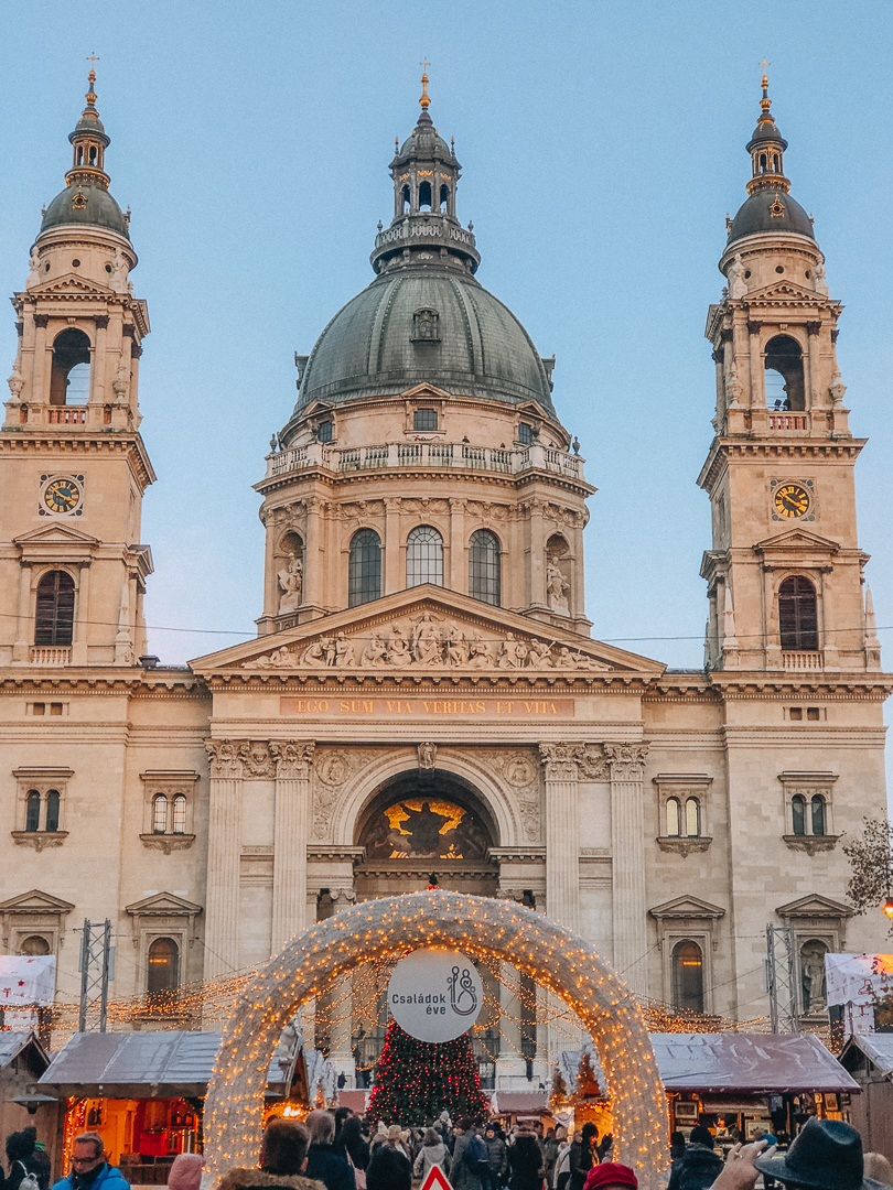 The lights, christmas tree and Christmas Market stalls at St. Stephen's Basilica in Budapest, Hungary