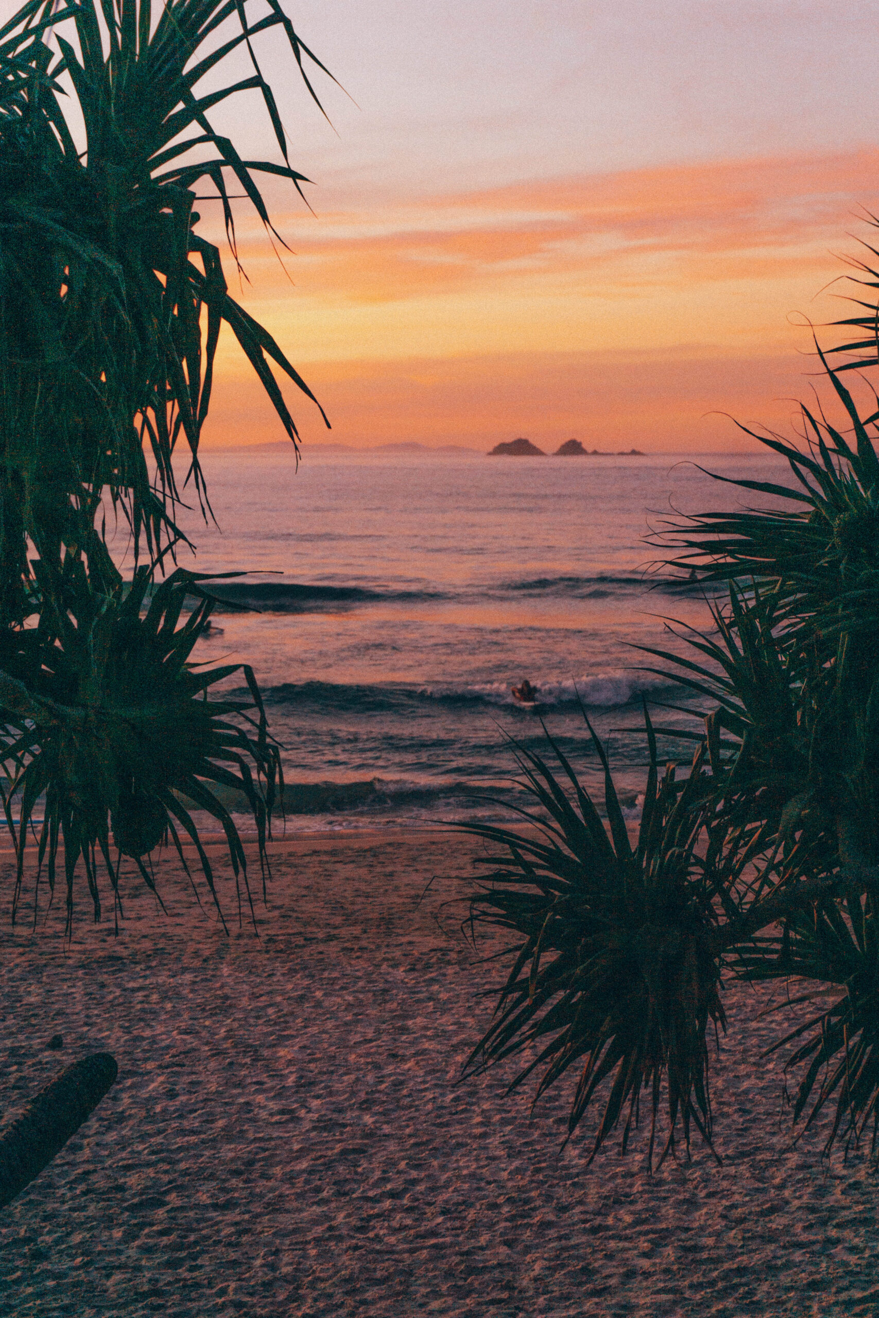 A beautiful bright sunset at Wategos beach in Byron Bay, Australia.