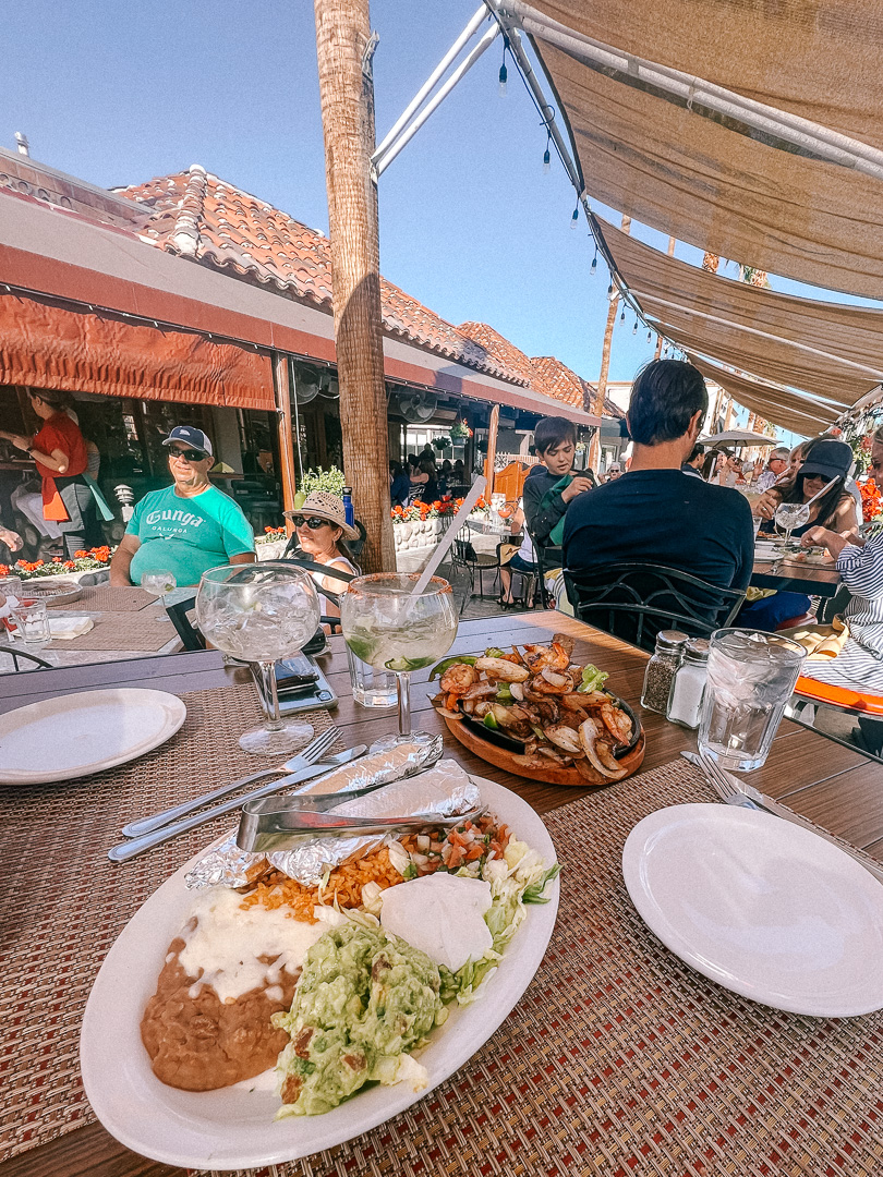 Two Mexican meals sit on a table in Palm Springs
