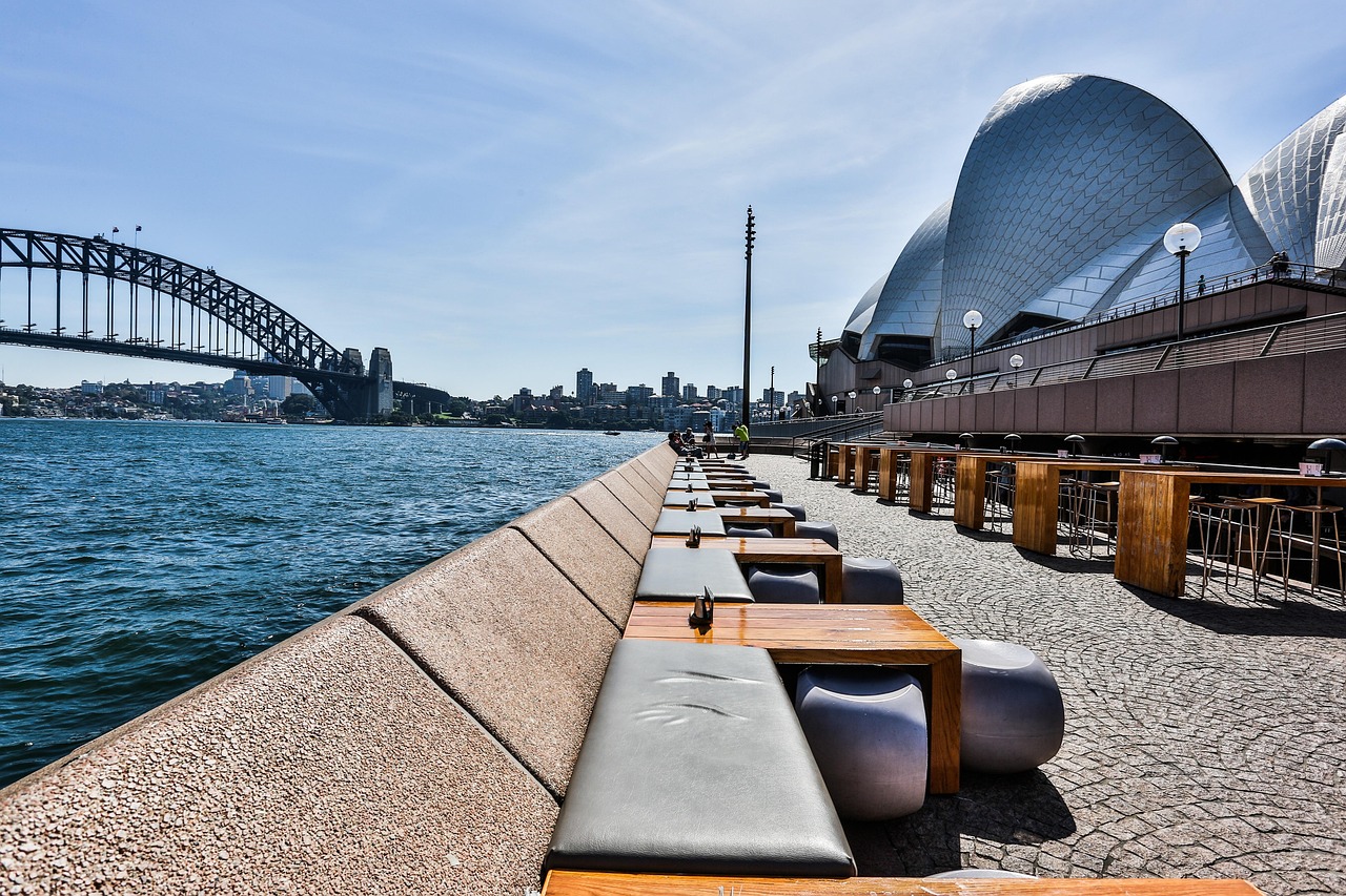 The empty seats of the Opera Bar, right beneath the Opera House and looking out to the iconic harbour bridge.