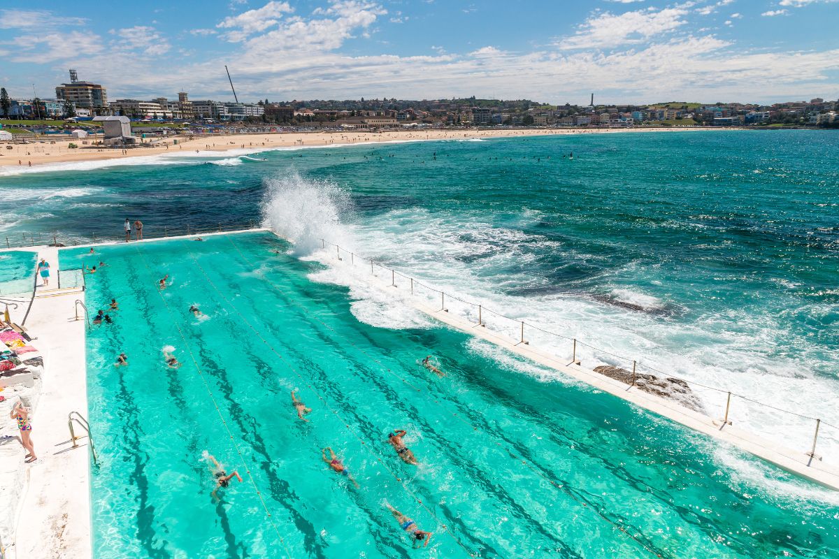 People swimming in the famous oceanside Bondi Beach Icebergs pool in Sydney, Australia