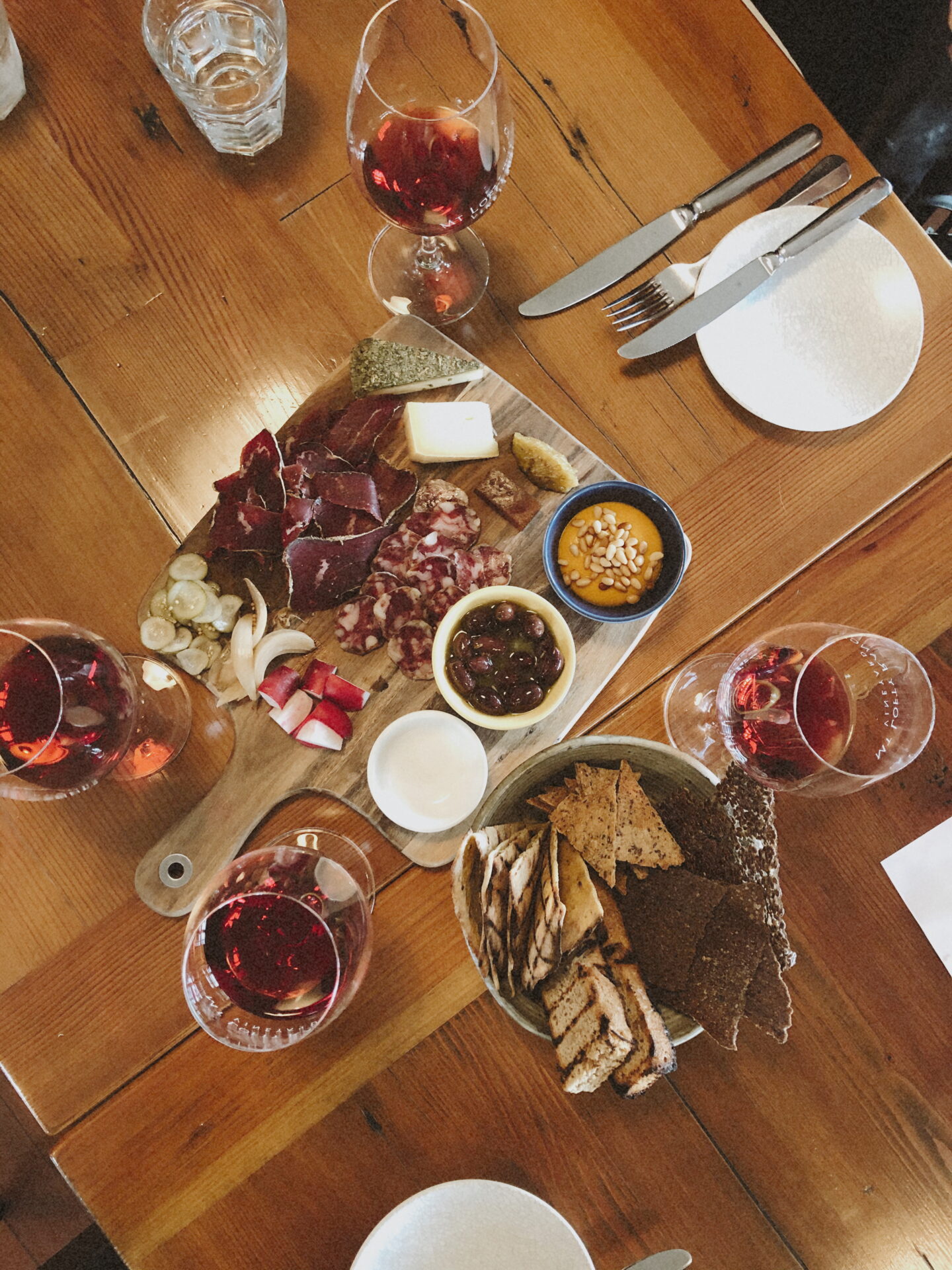 Looking down at a wine tasting and charcuterie board in the Adelaide Hills