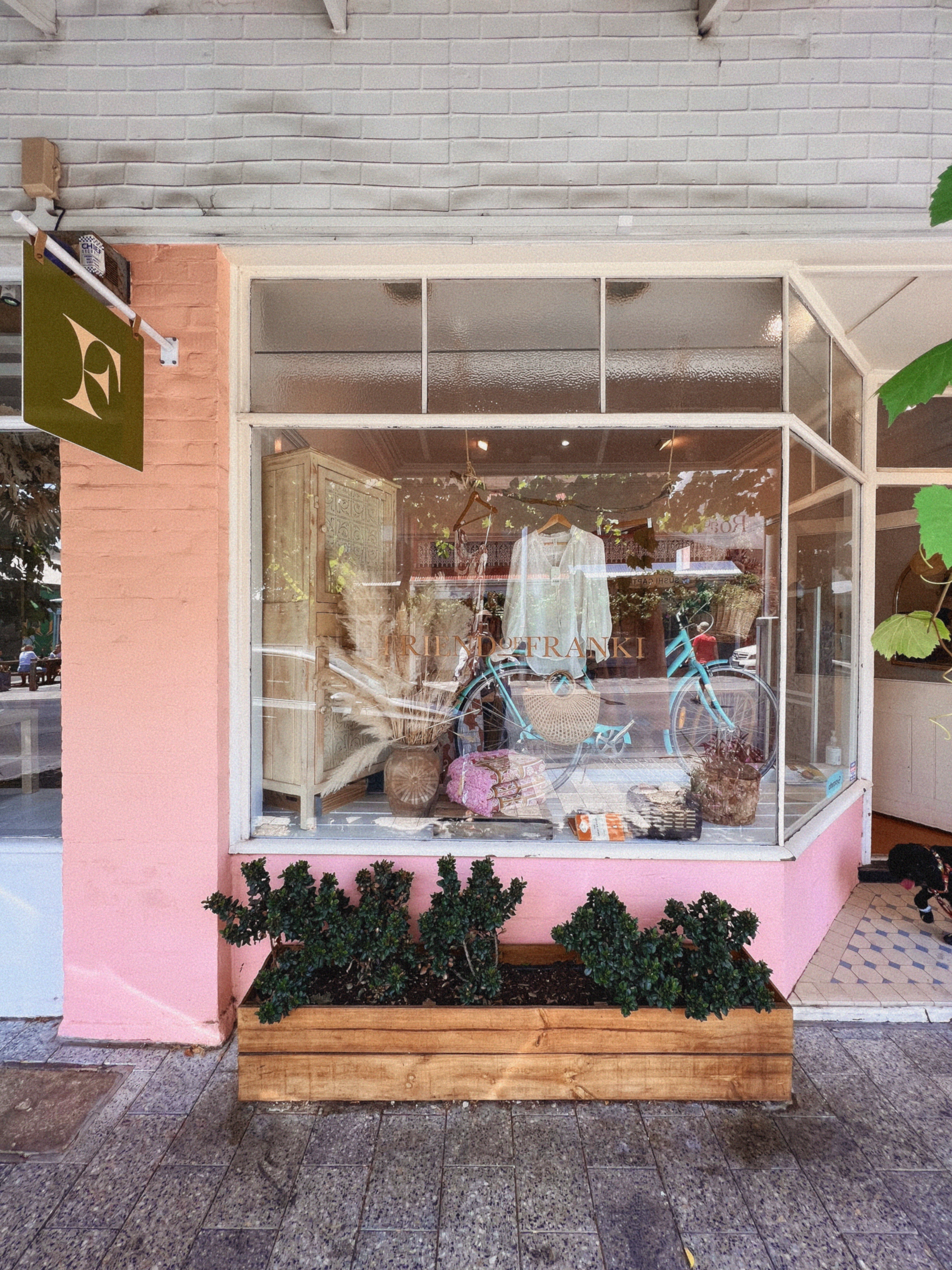 The beautiful pink exterior of a cool boutique on King William Road in Adelaide - a fun place to shop